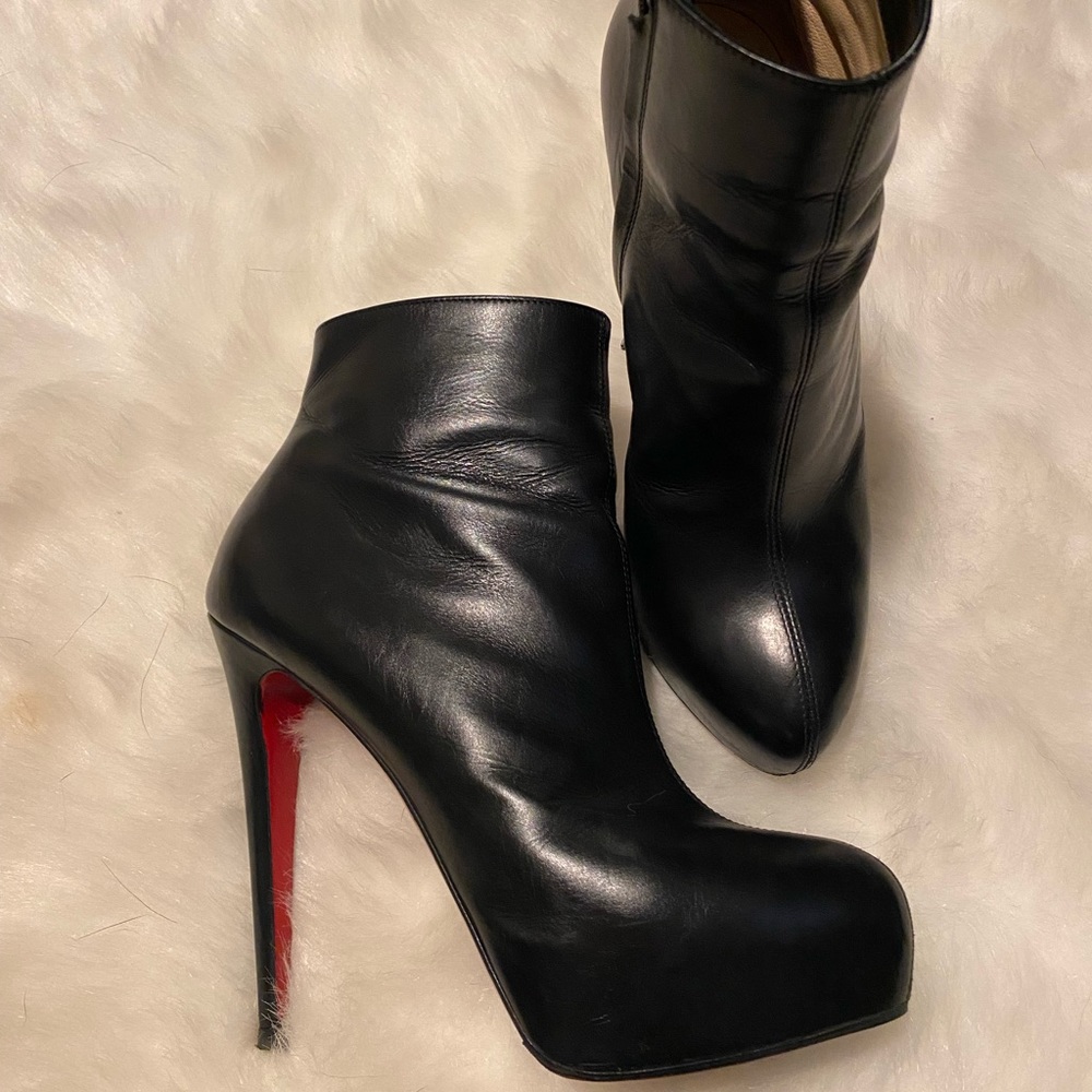Want to trade Christian Louboutin black leather booties 38.5/7.5